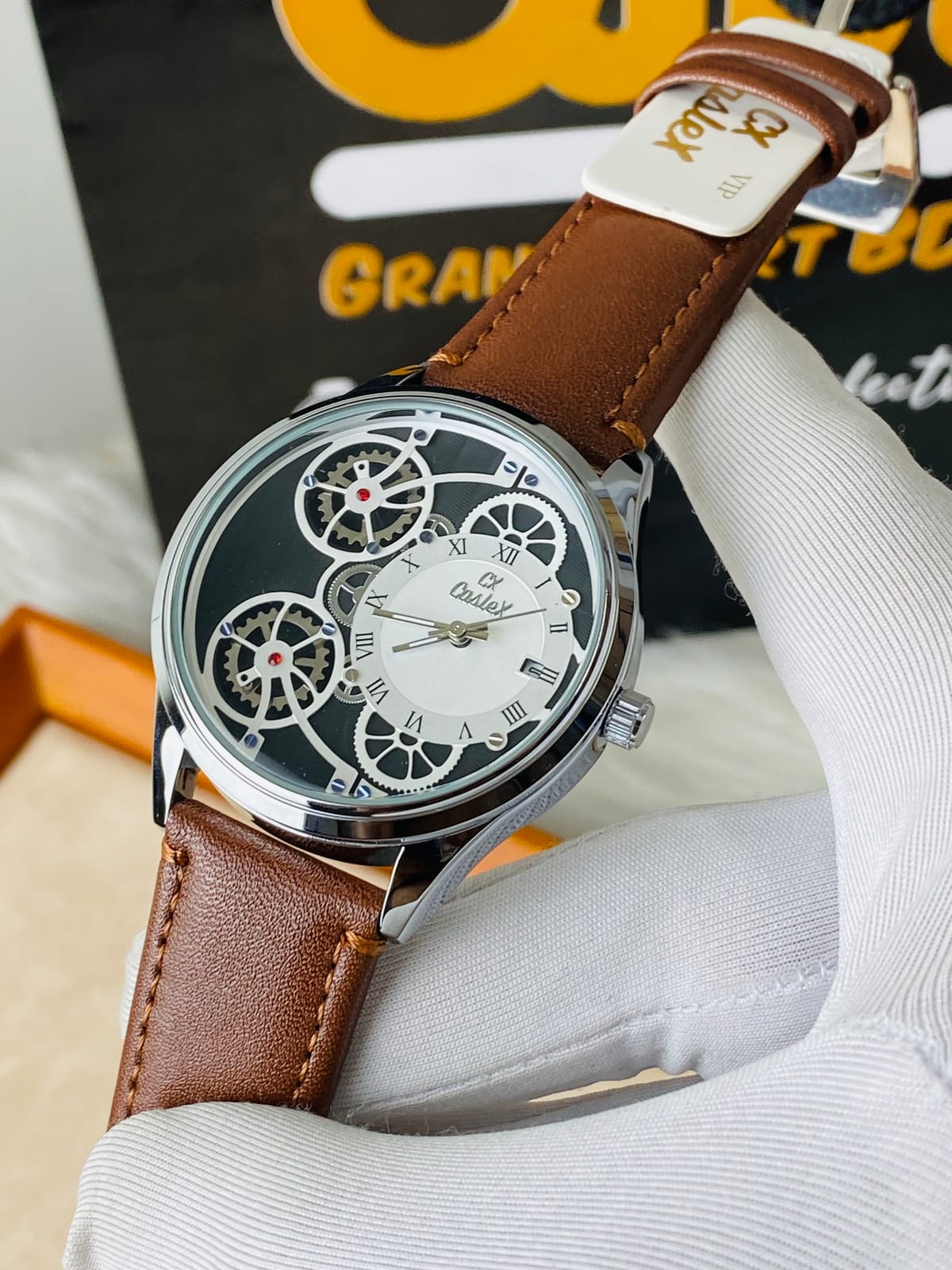 Caslex skeleton watch with a brown leather strap.