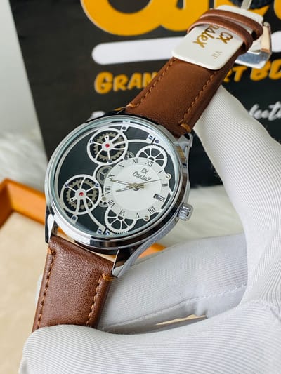 Caslex skeleton watch with a brown leather strap._img_0